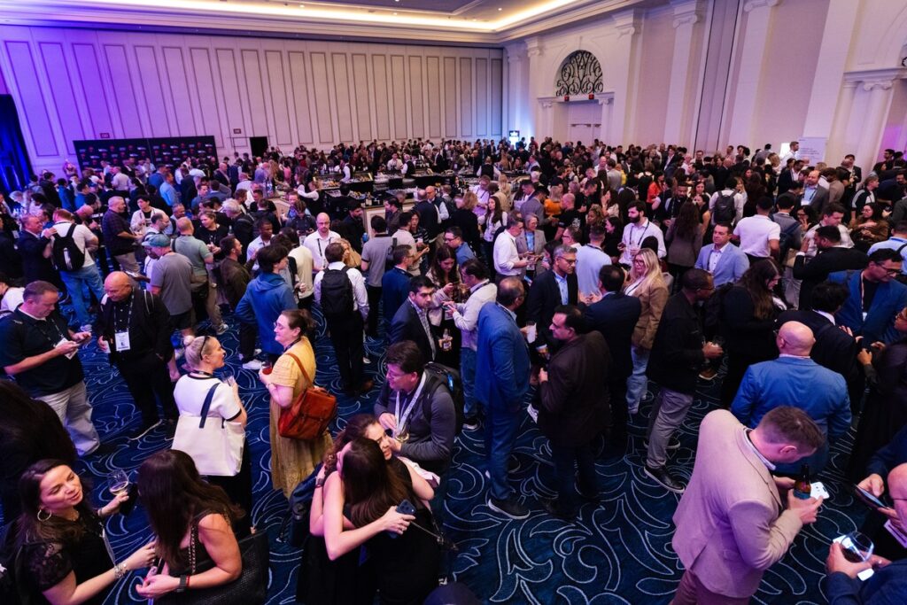Delegates networking at a Money20/20 USA 2026 evening reception